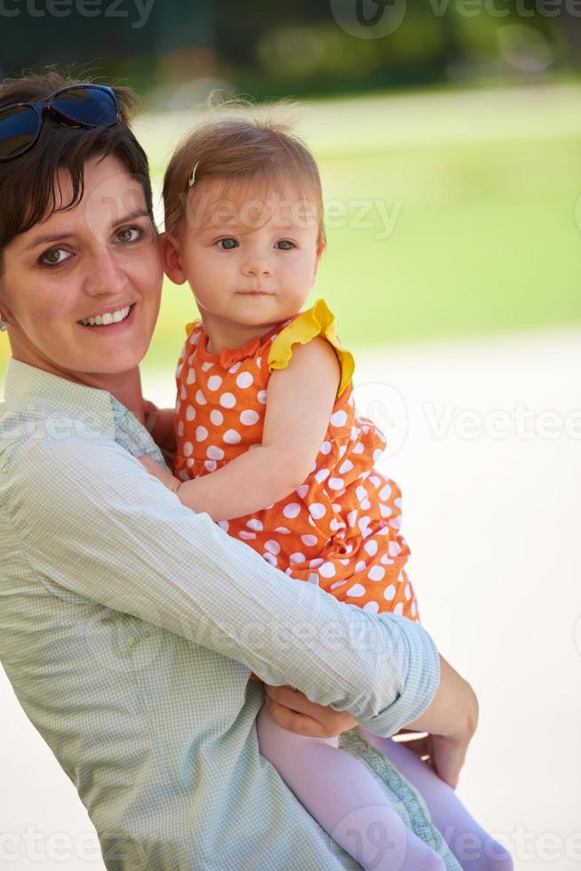 mother and baby in park photo