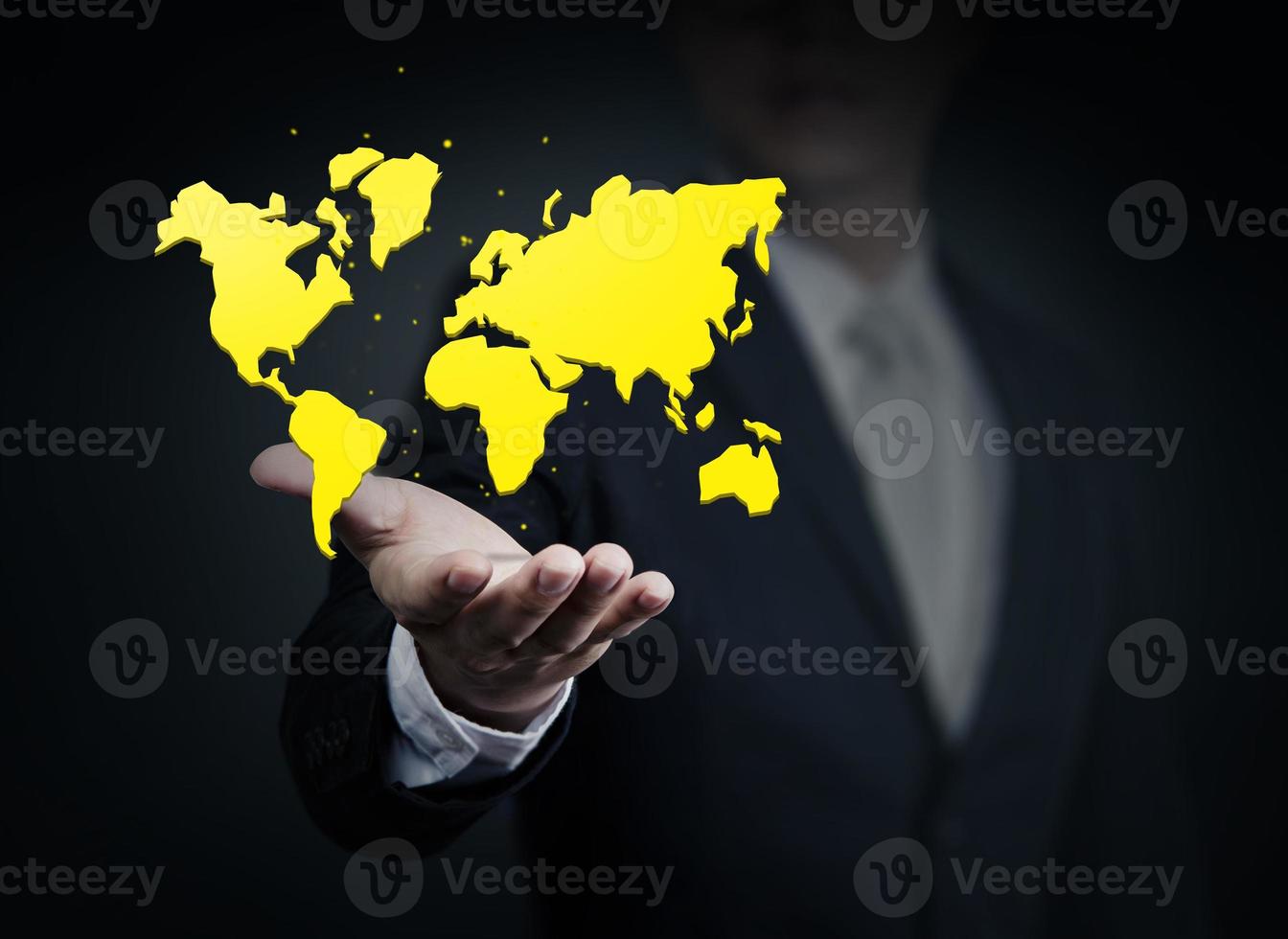 Business Man holding a world. Business, technology, internet and networking concept. photo