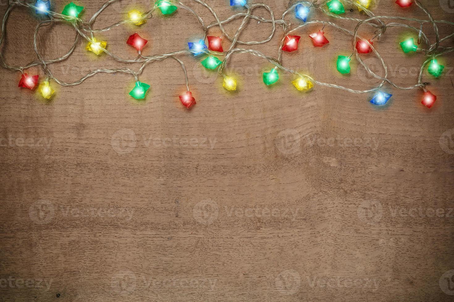 Christmas rustic background - vintage planked wood with lights and free text space photo