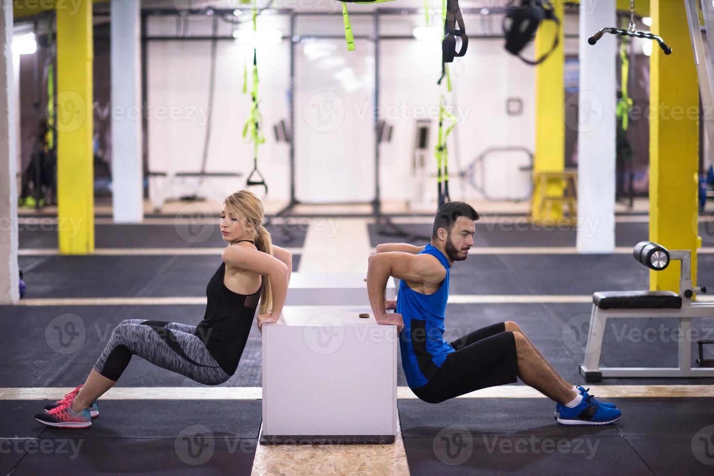 athletes working out their arms photo