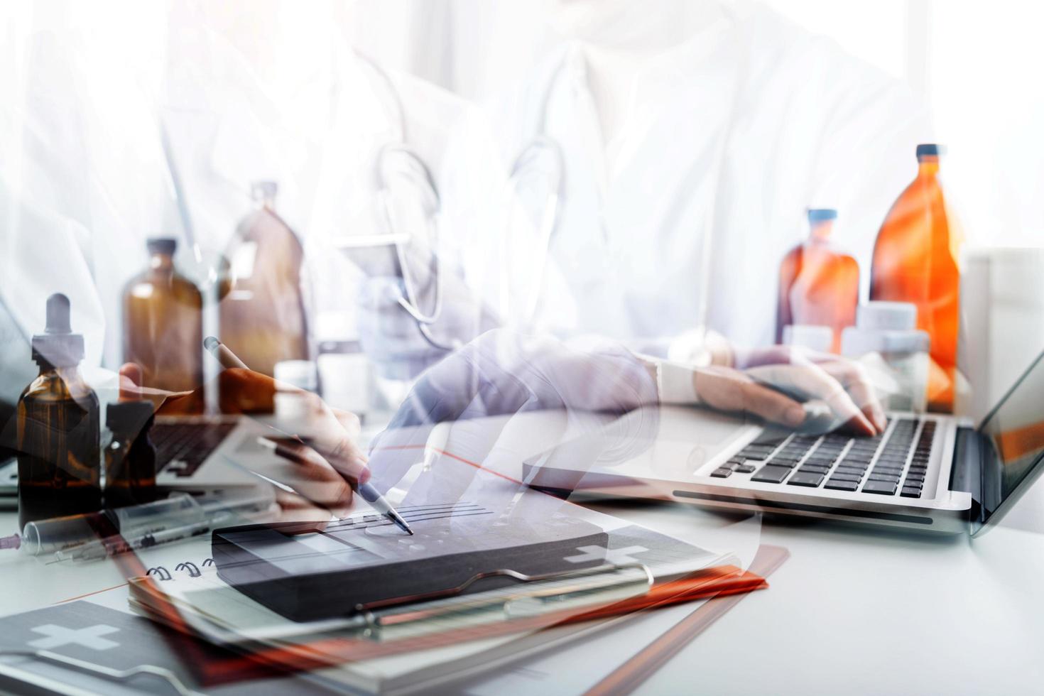 Medicine doctor and stethoscope touching icon medical network connection with modern interface on digital tablet in hospital background. Medical technology network concept photo
