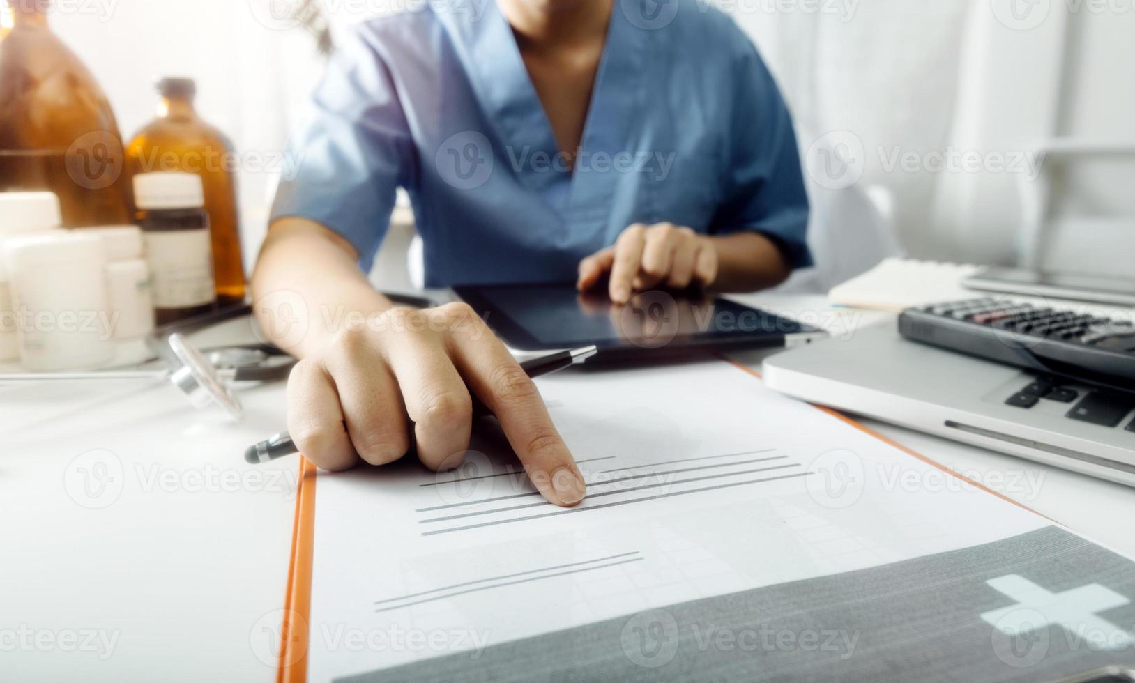 Medicine doctor and stethoscope touching icon medical network connection with modern interface on digital tablet in hospital background. Medical technology network concept photo