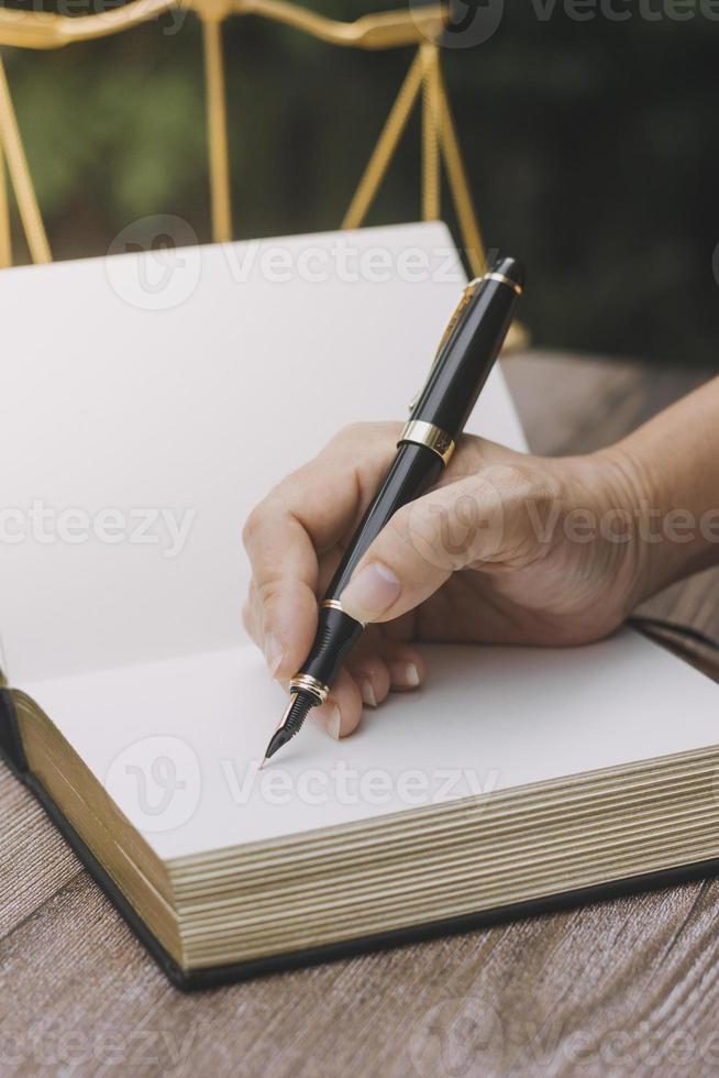 justice and law concept.Male judge in a courtroom on wooden table and Counselor or Male lawyer working in office. Legal law, advice and justice concept. photo