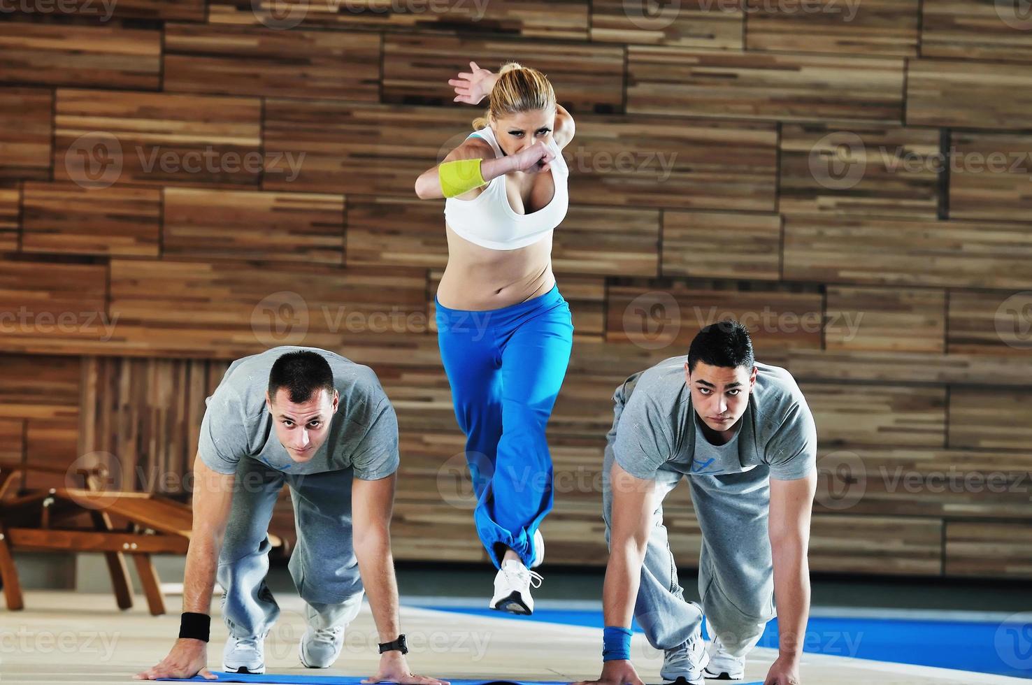 young adults group in fitness club photo