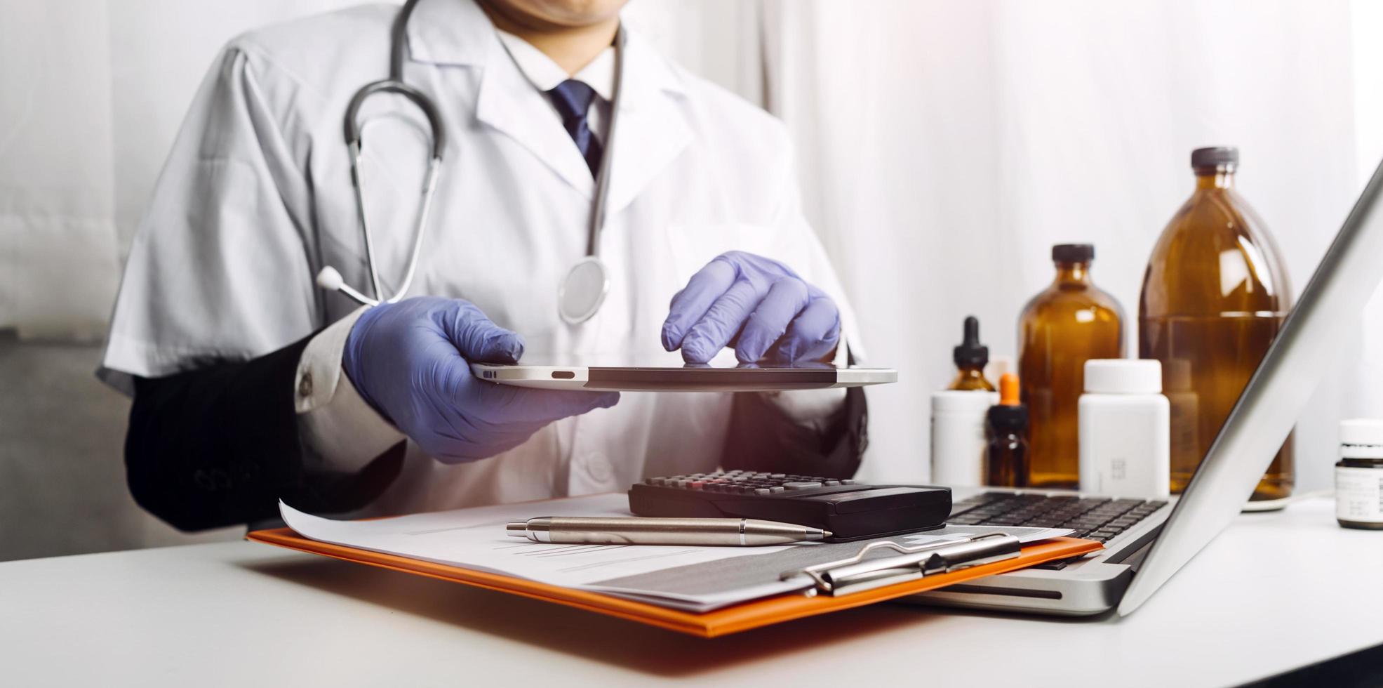 Medicine doctor and stethoscope touching icon medical network connection with modern interface on digital tablet in hospital background. Medical technology network concept photo