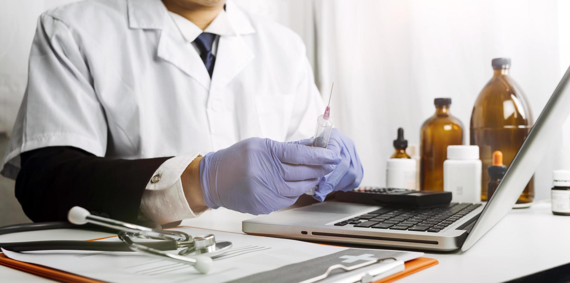 Medicine doctor and stethoscope touching icon medical network connection with modern interface on digital tablet in hospital background. Medical technology network concept photo