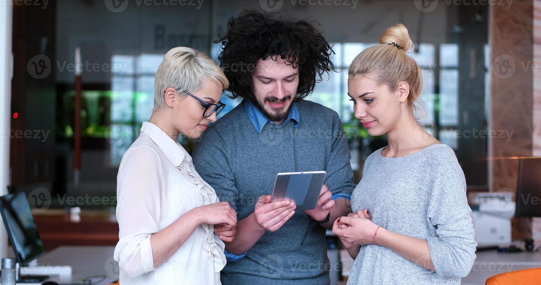 Startup Business Team At A Meeting at modern office building photo