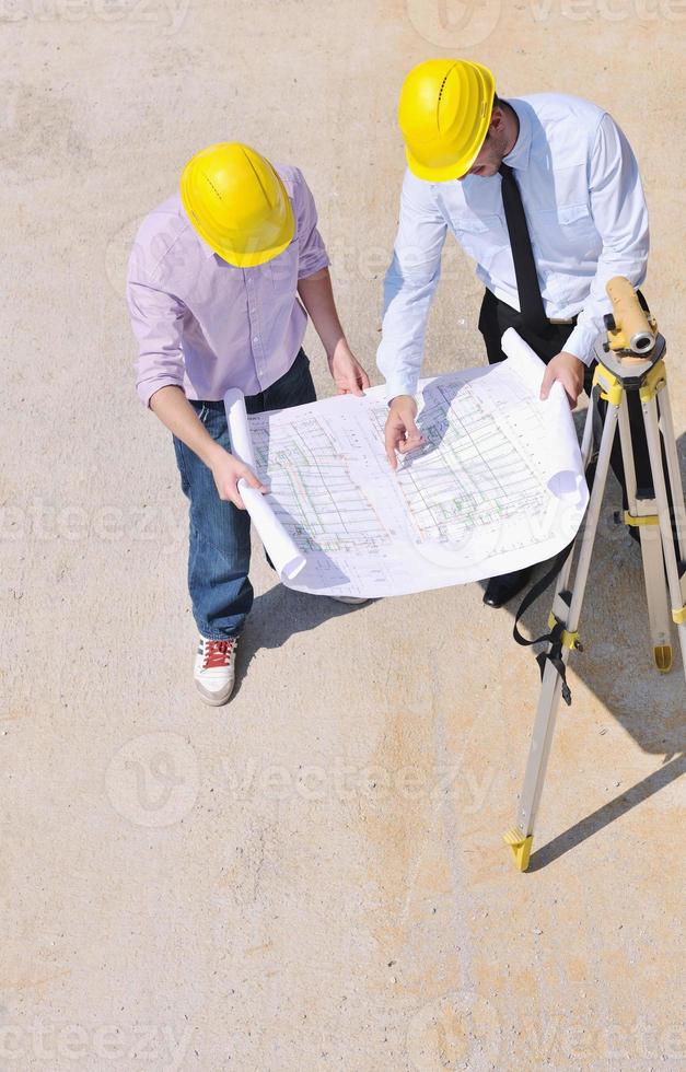 Team of architects on construciton site photo