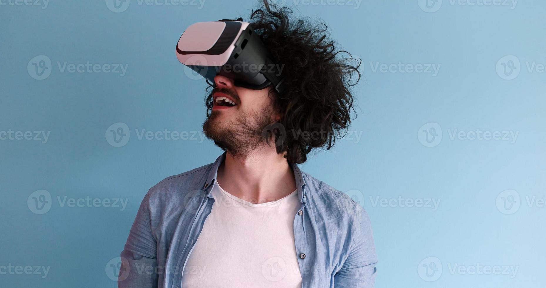 man using VR headset glasses of virtual reality photo