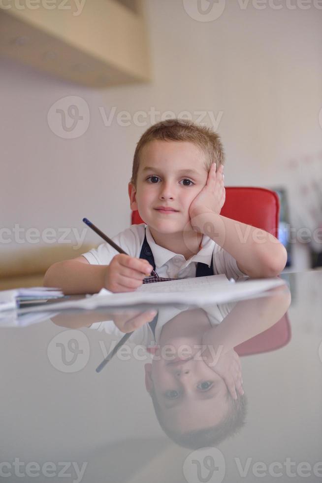 Boy doing homework photo
