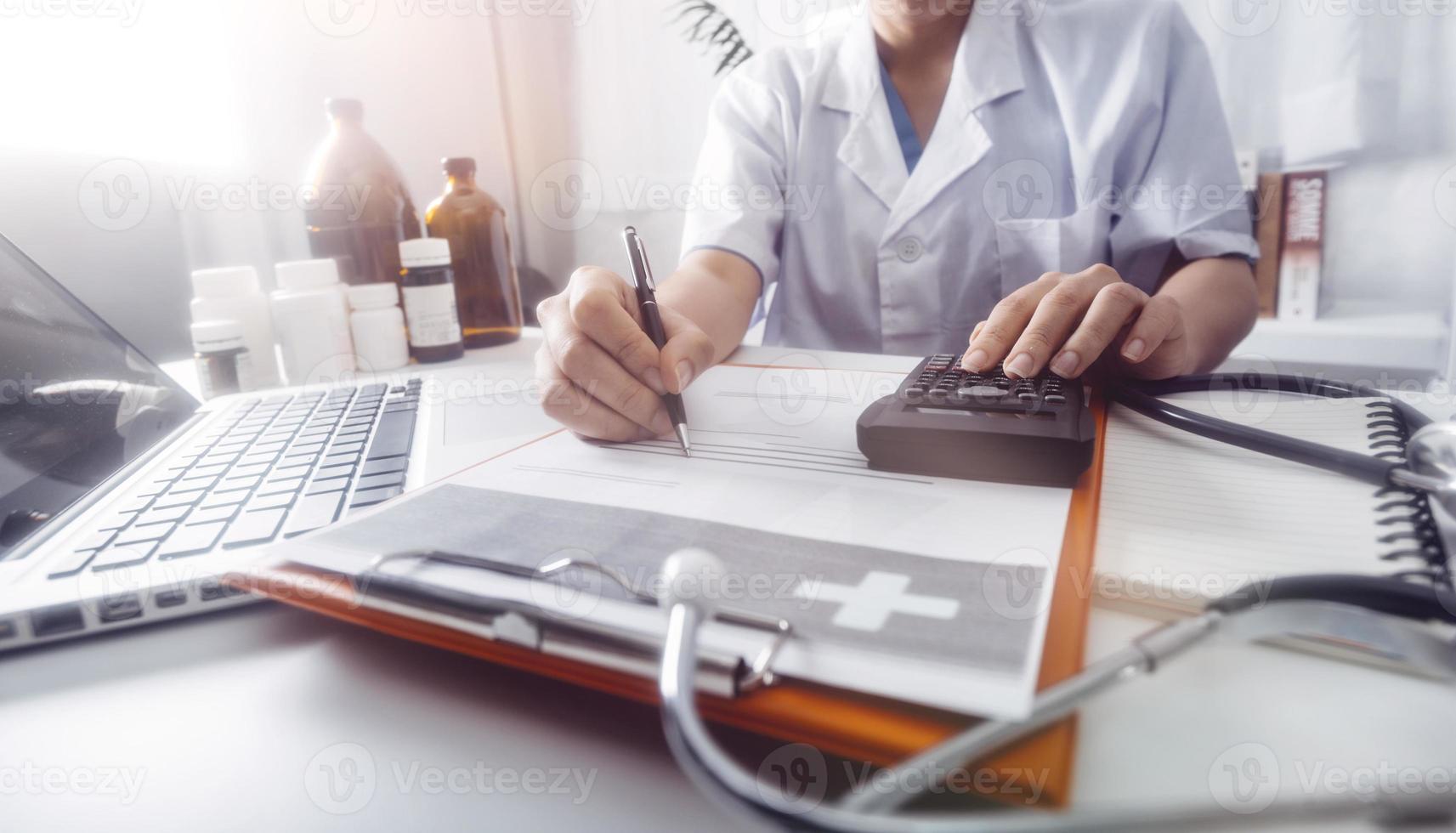 Medicine doctor and stethoscope touching icon medical network connection with modern interface on digital tablet in hospital background. Medical technology network concept photo