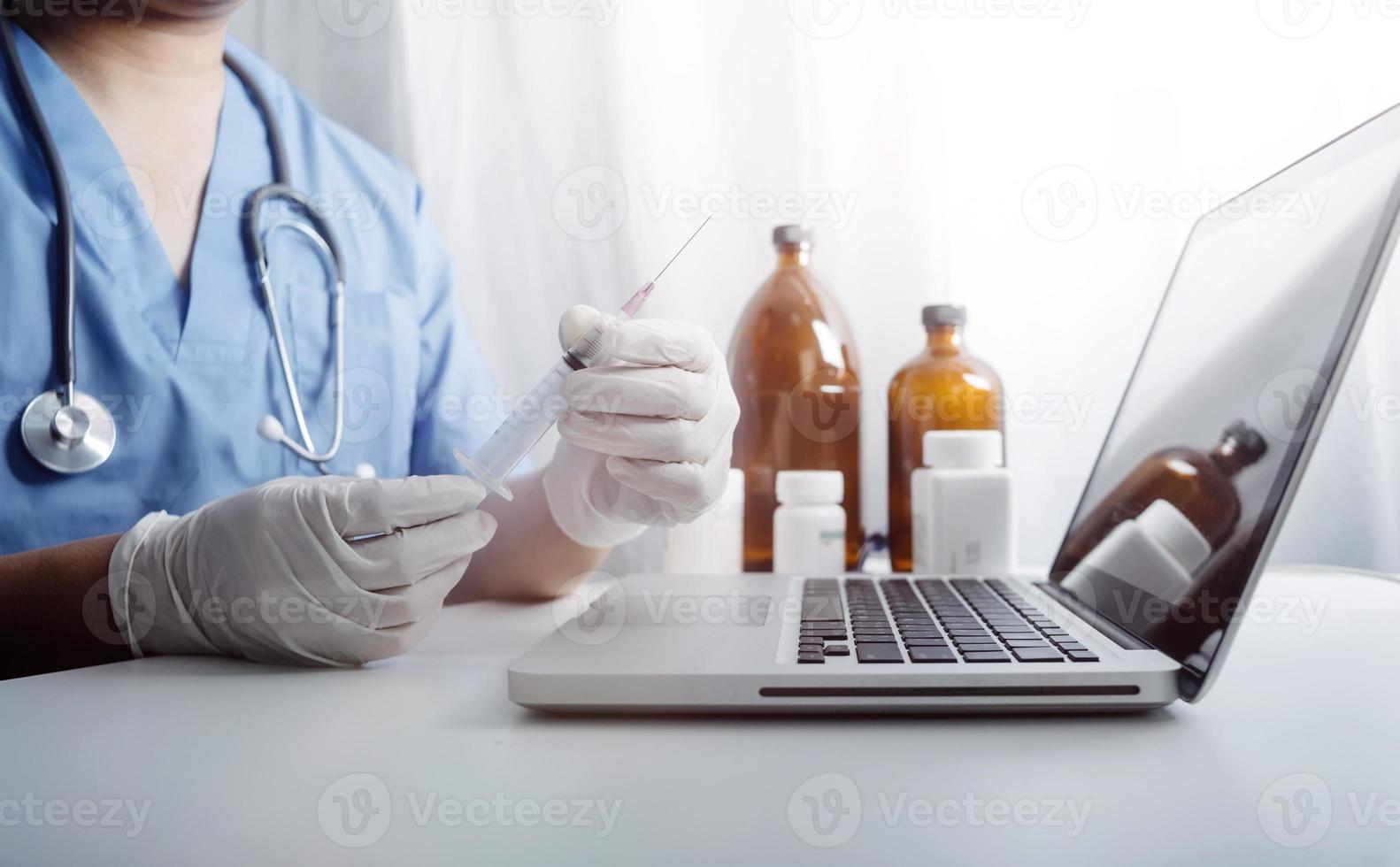 Medicine doctor and stethoscope touching icon medical network connection with modern interface on digital tablet in hospital background. Medical technology network concept photo