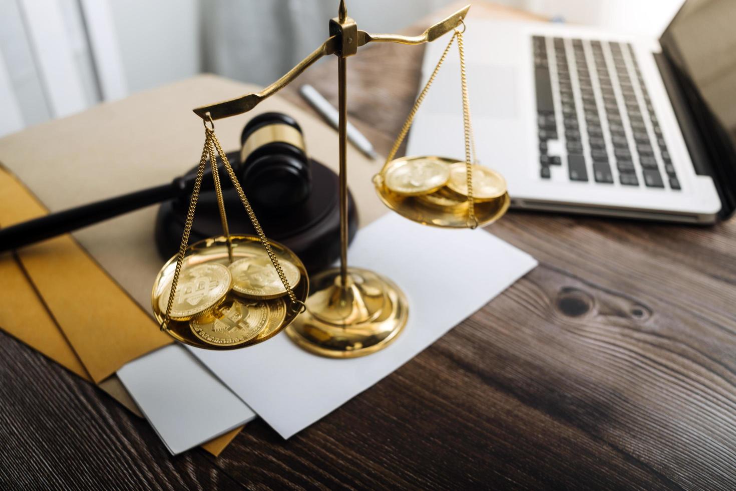 Business and lawyers discussing contract papers with brass scale on desk in office. Law, legal services, advice, justice and law concept picture with film grain effect photo