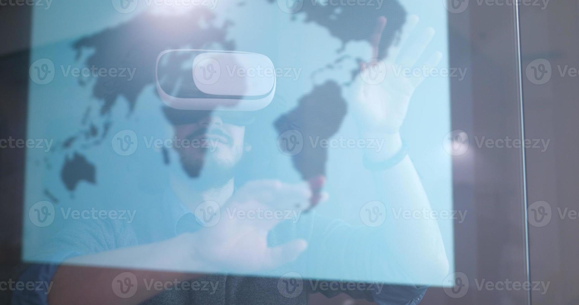 man using VR-headset glasses of virtual reality photo