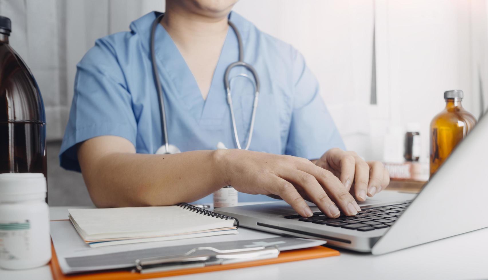 Medicine doctor and stethoscope touching icon medical network connection with modern interface on digital tablet in hospital background. Medical technology network concept photo