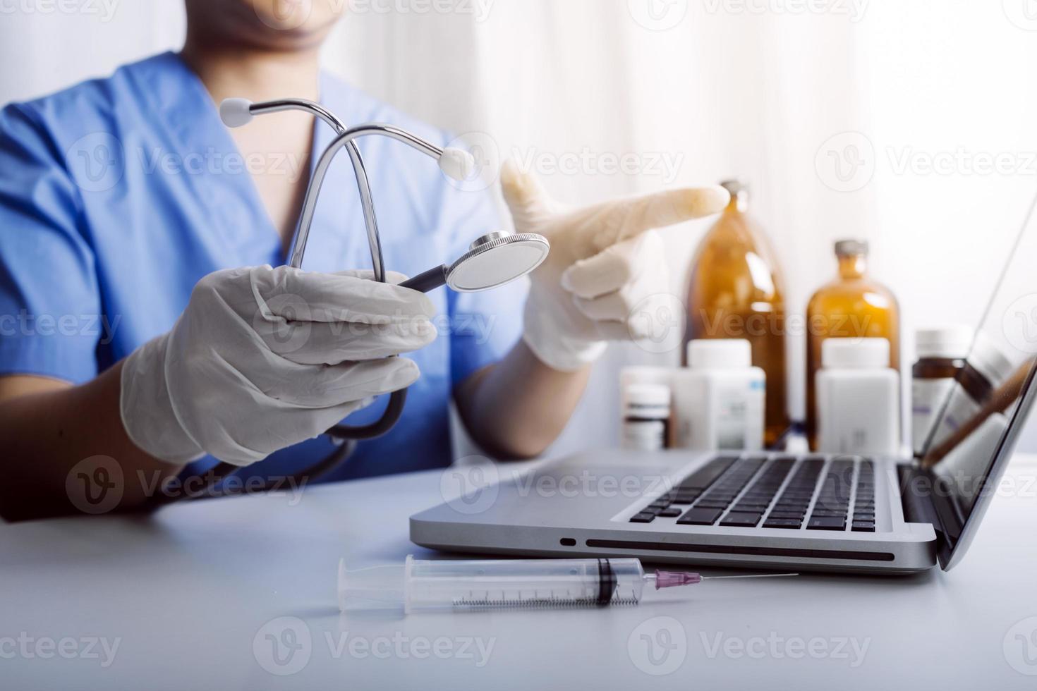 Medicine doctor and stethoscope touching icon medical network connection with modern interface on digital tablet in hospital background. Medical technology network concept photo