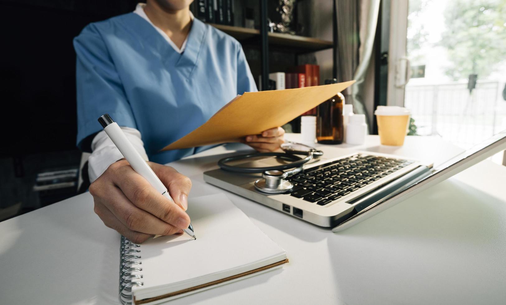 Medicine doctor and stethoscope touching icon medical network connection with modern interface on digital tablet in hospital background. Medical technology network concept photo