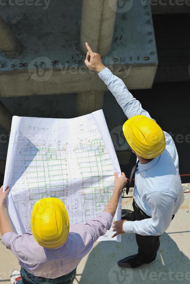 Team of architects on construciton site photo