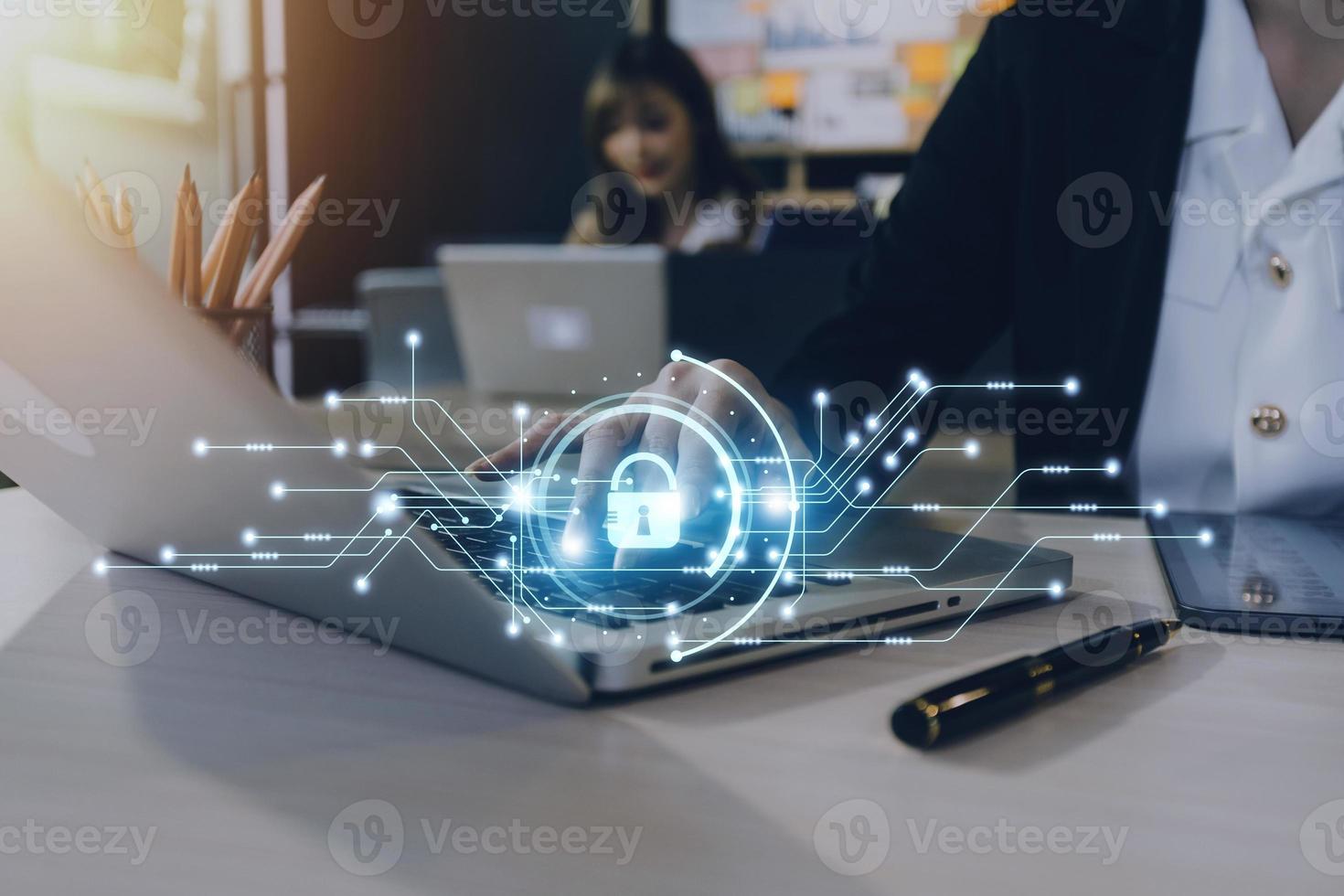 Cybersecurity and privacy concepts to protect data. Lock icon and internet network security technology. Businessman protecting personal data on smart phone with virtual screen interfaces. photo