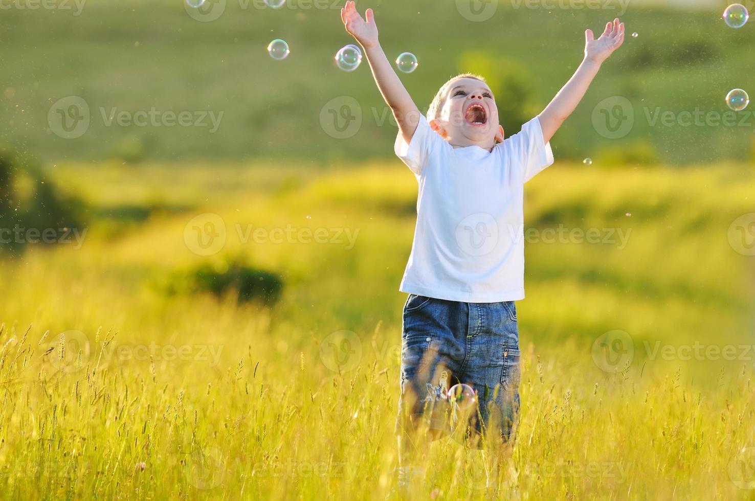 Child and bubbles photo
