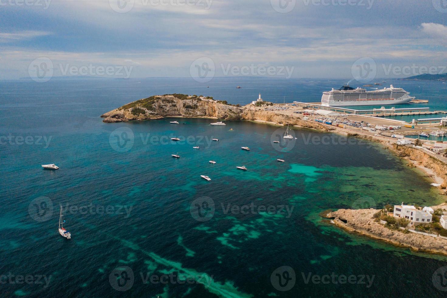 Aerial view of city and bay with yachts. photo