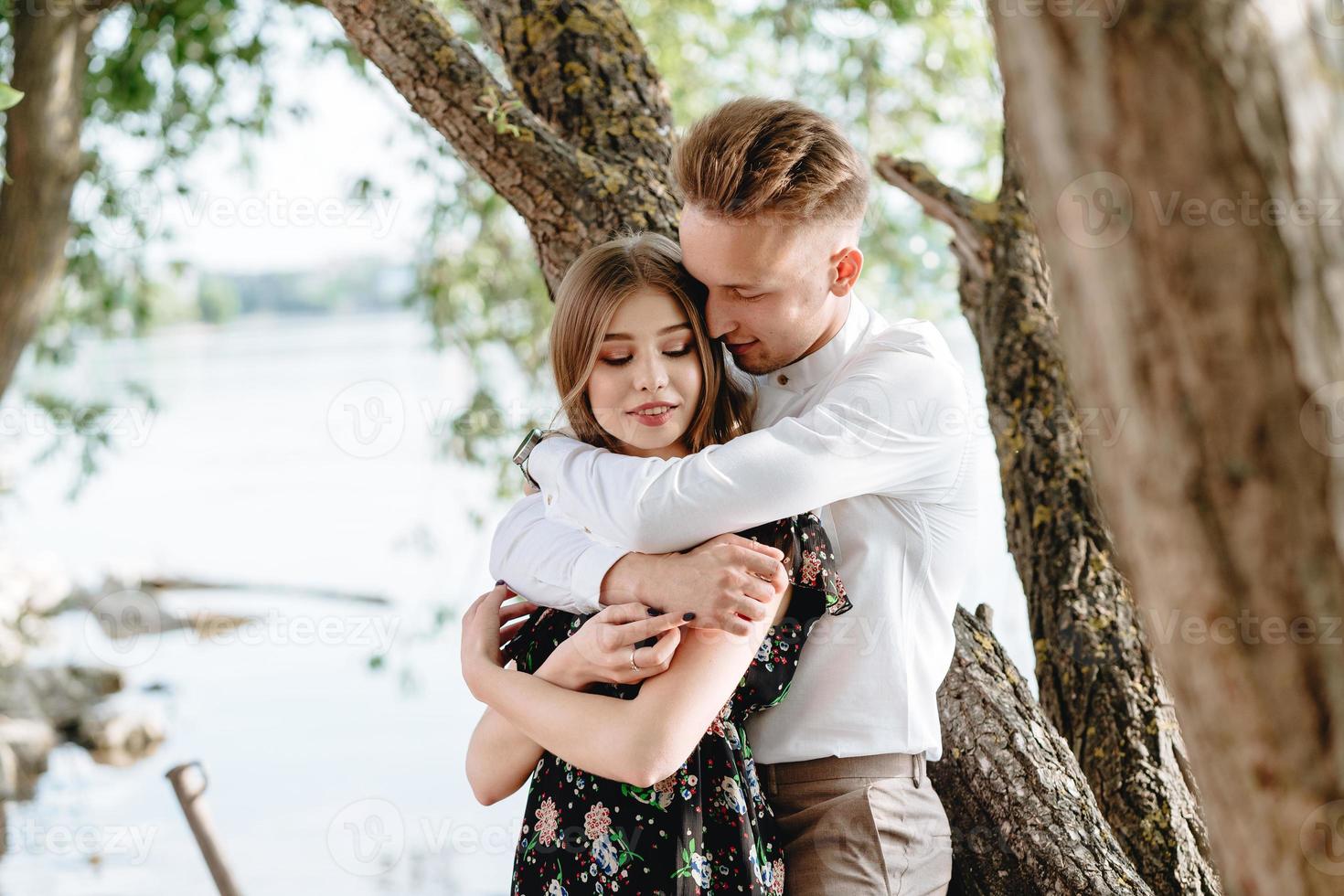 A pair of lovers posing on the camera. photo