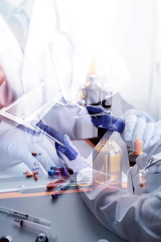 Medicine doctor and stethoscope touching icon medical network connection with modern interface on digital tablet in hospital background. Medical technology network concept photo