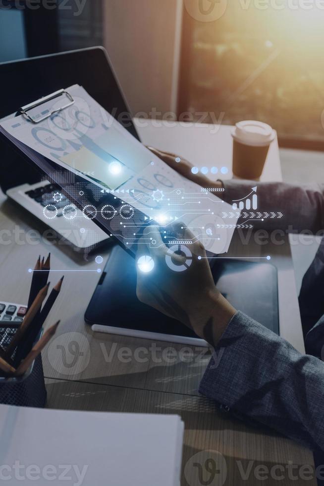 Cyber Security Internet And Networking Concept. Businessman Hand Working With laptop computer and Padlock Icon on screen. Digital crime by an anonymous hacker, data protection. photo