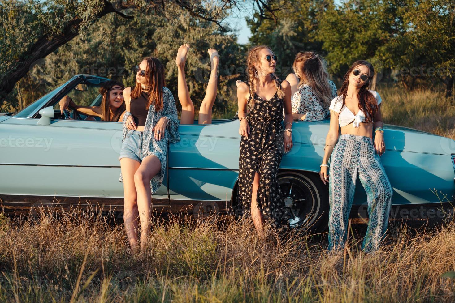 Six girls have fun in the countryside photo