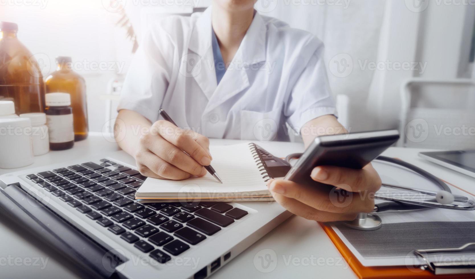 Medicine doctor and stethoscope touching icon medical network connection with modern interface on digital tablet in hospital background. Medical technology network concept photo
