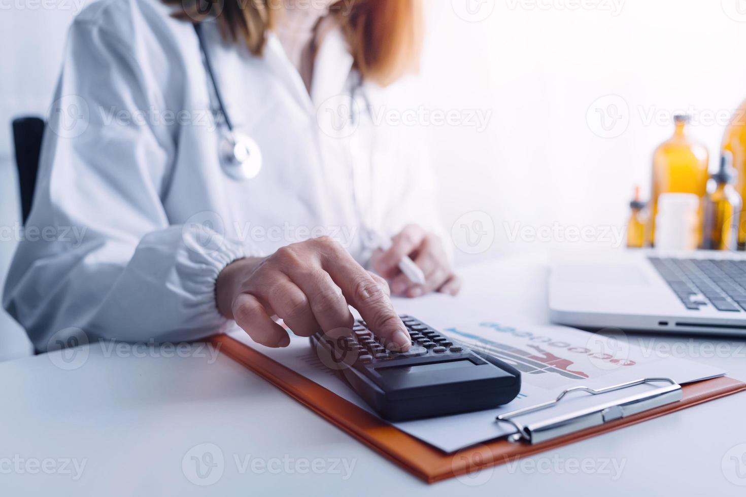 Medicine doctor and stethoscope touching icon medical network connection with modern interface on digital tablet in hospital background. Medical technology network concept photo