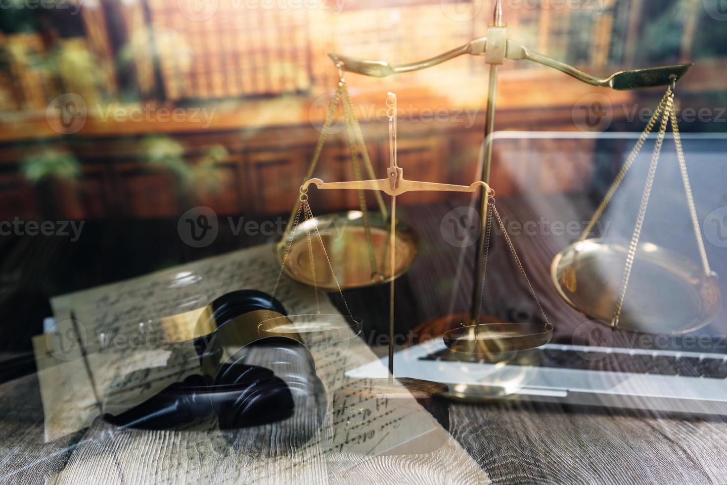 justice and law concept.Male judge in a courtroom on wooden table and Counselor or Male lawyer working in office. Legal law, advice and justice concept. photo