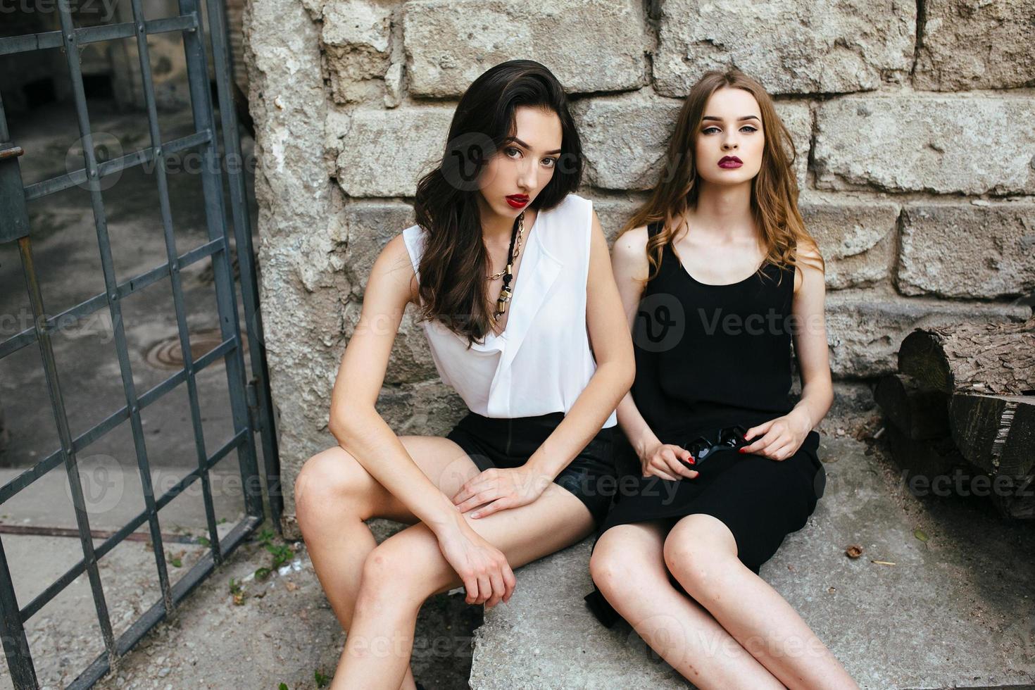Two young beautiful girls photo