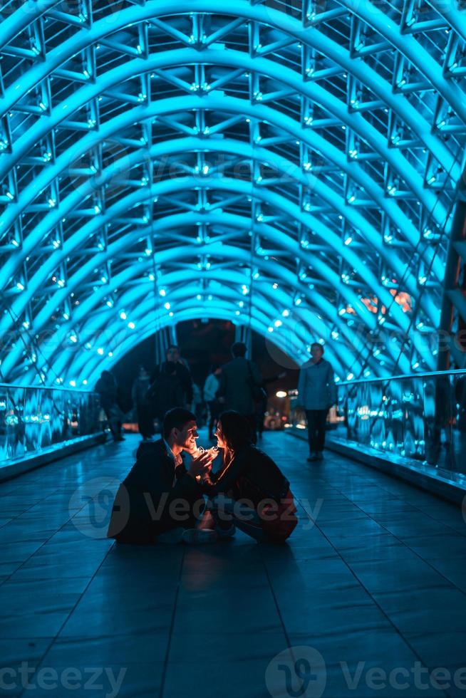 Loving couple on the bridge of Peace photo