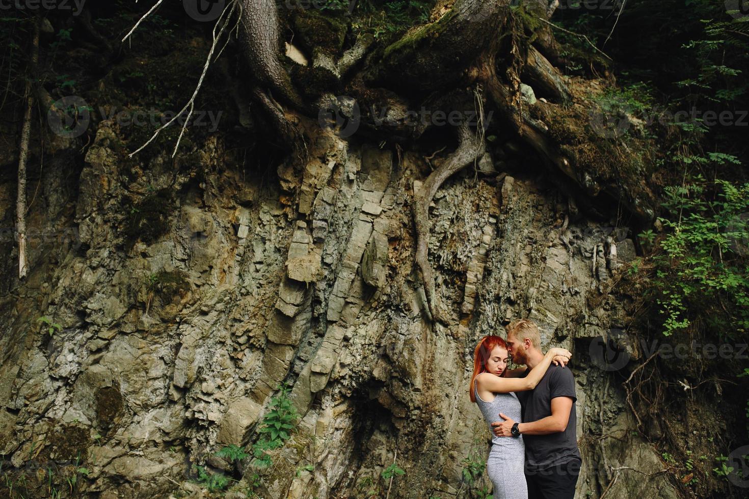 beautiful couple on the background of forest photo