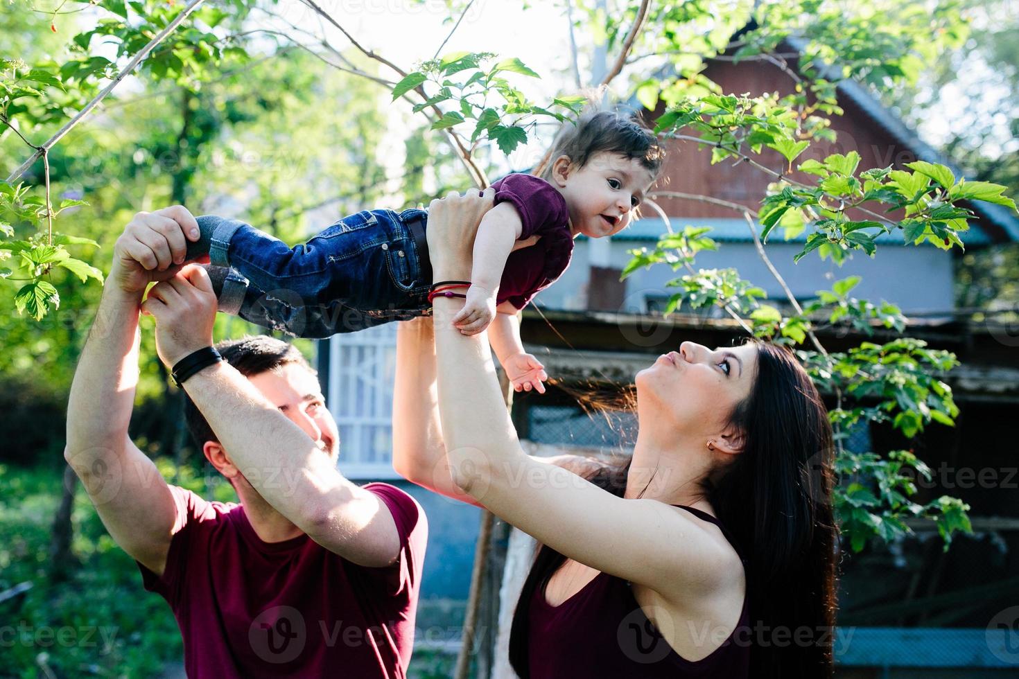 young family with a child on the nature photo