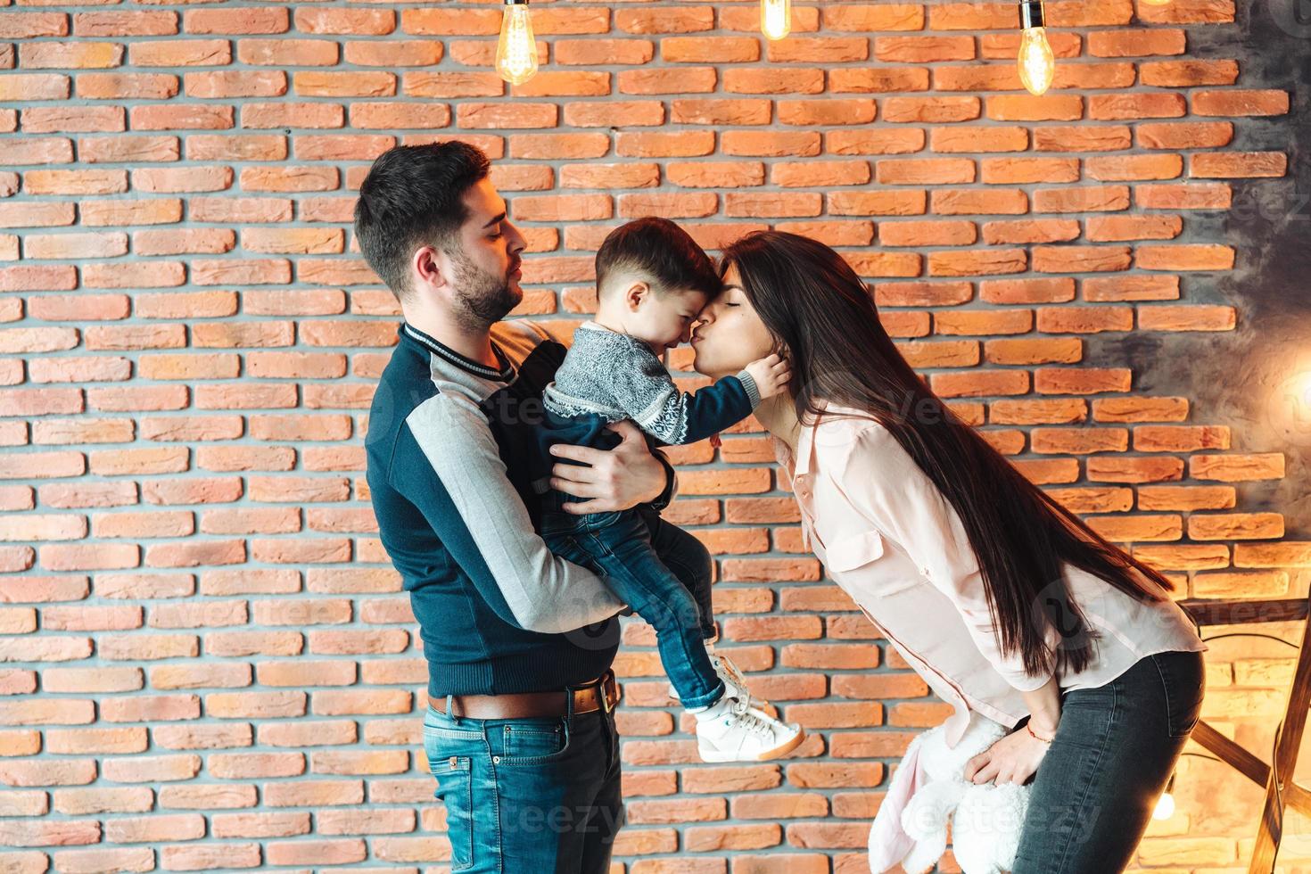 young family having fun at home photo