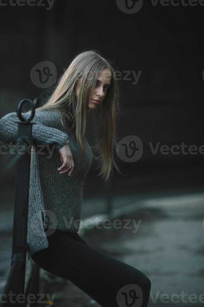 Fashion girl posing on the street photo