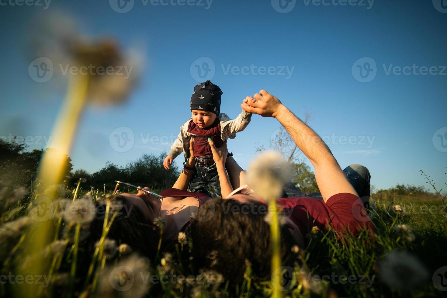 young family with a child on the nature photo