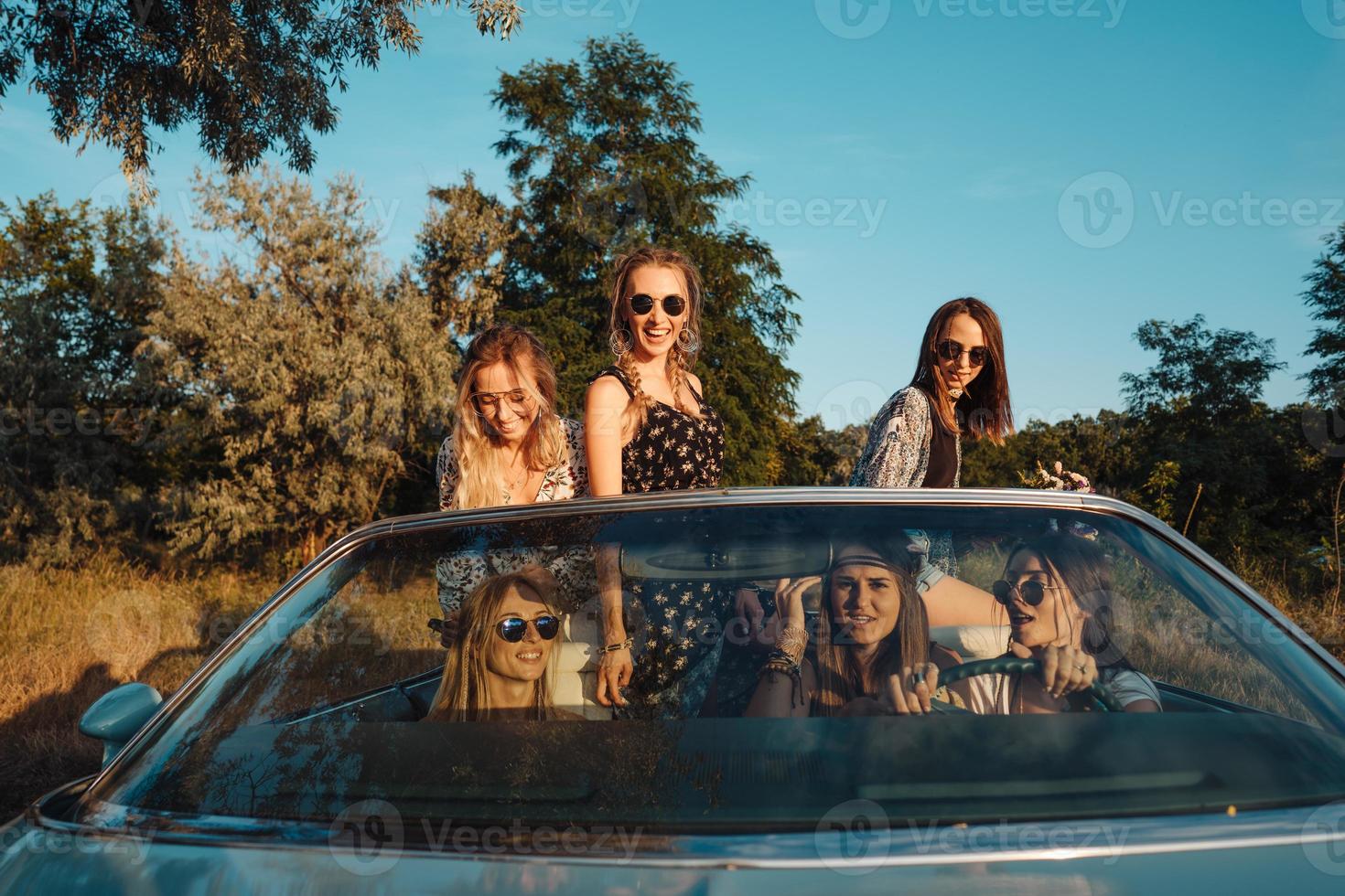 Six girls have fun in the countryside photo