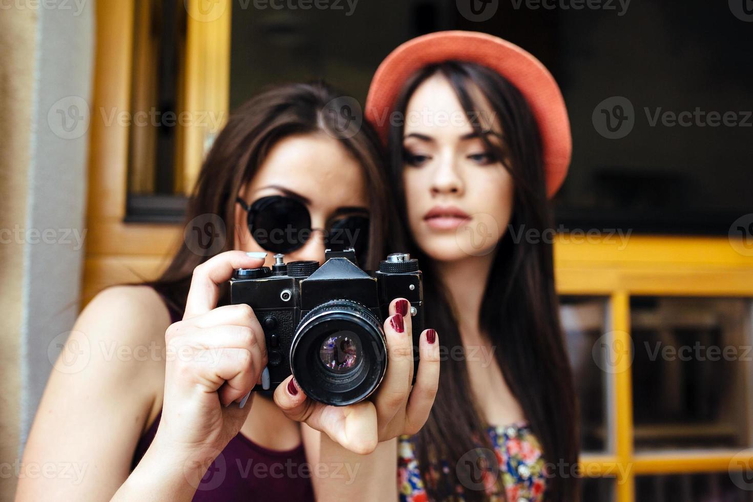 Two young beautiful girls photo