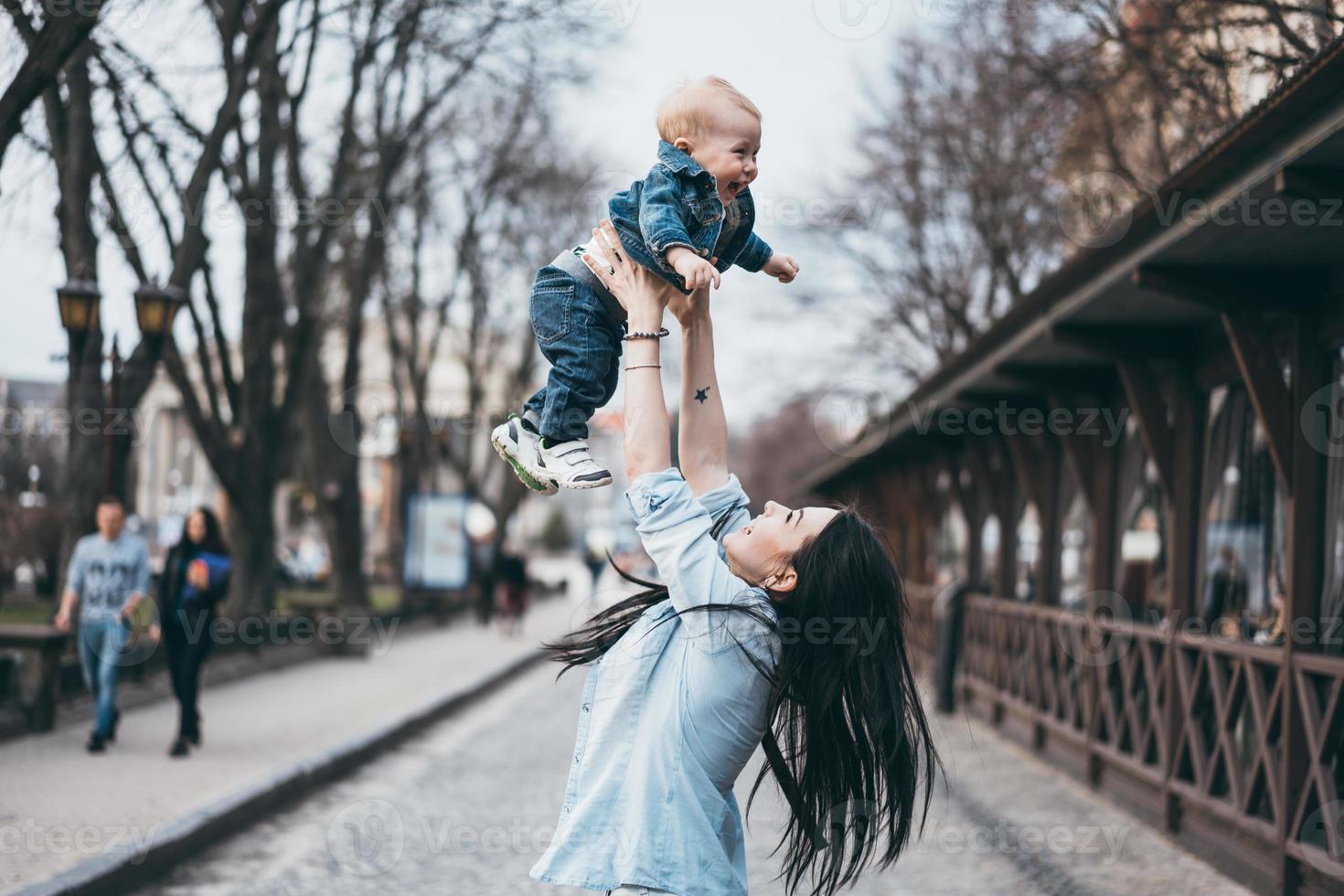 Young mother with her baby boy photo