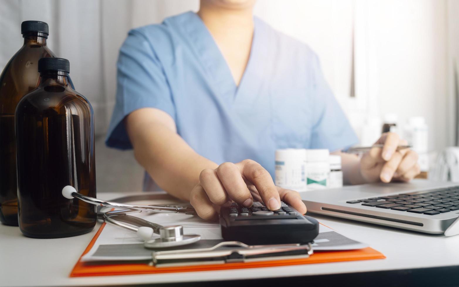 Medicine doctor and stethoscope touching icon medical network connection with modern interface on digital tablet in hospital background. Medical technology network concept photo