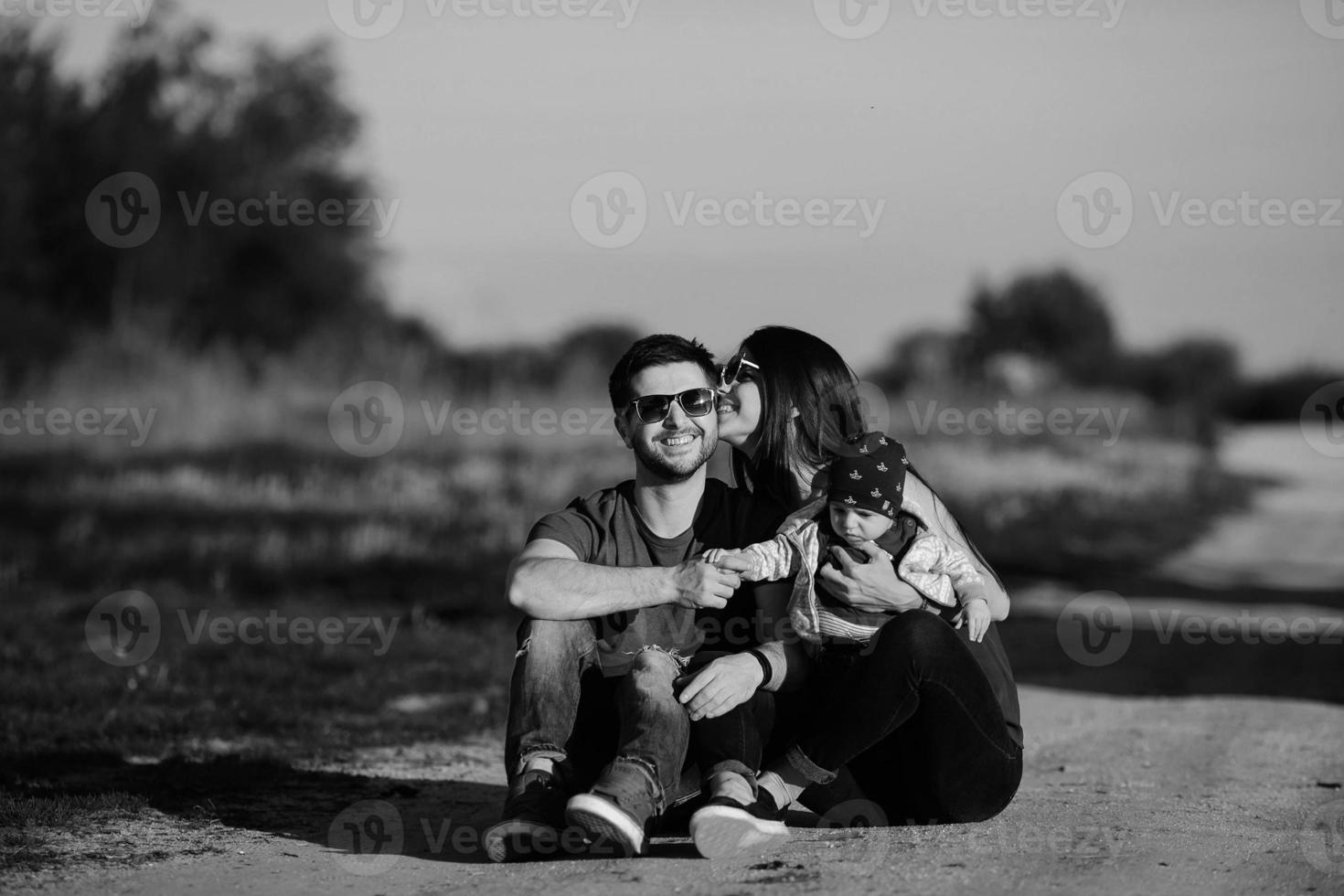 young family with a child on the nature photo