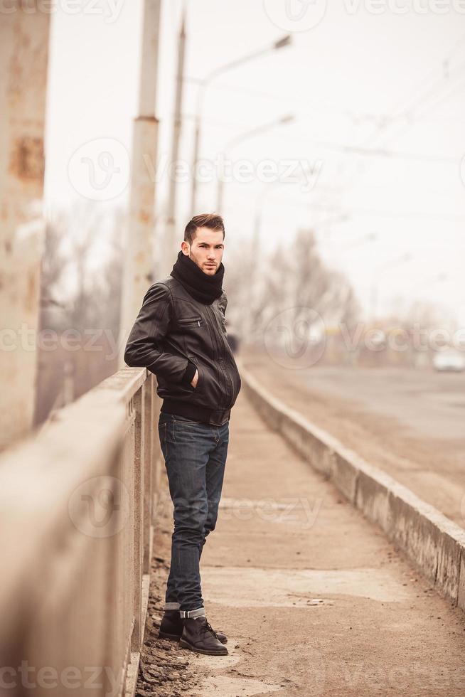 Fashion male model on the road photo