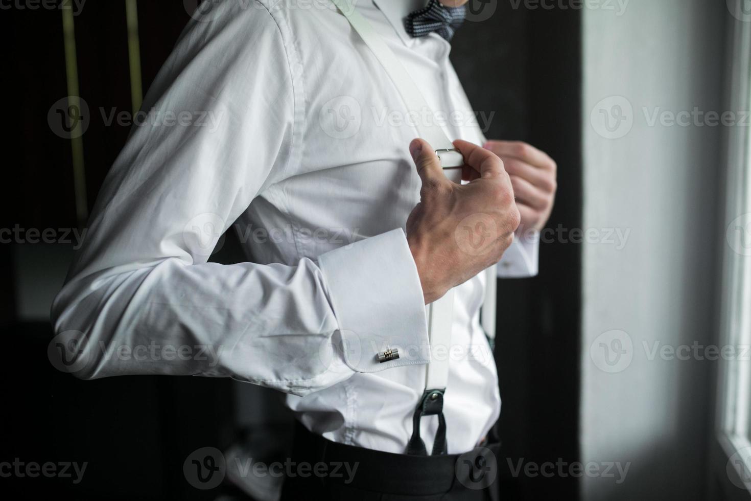 Groom preparing for Wedding photo