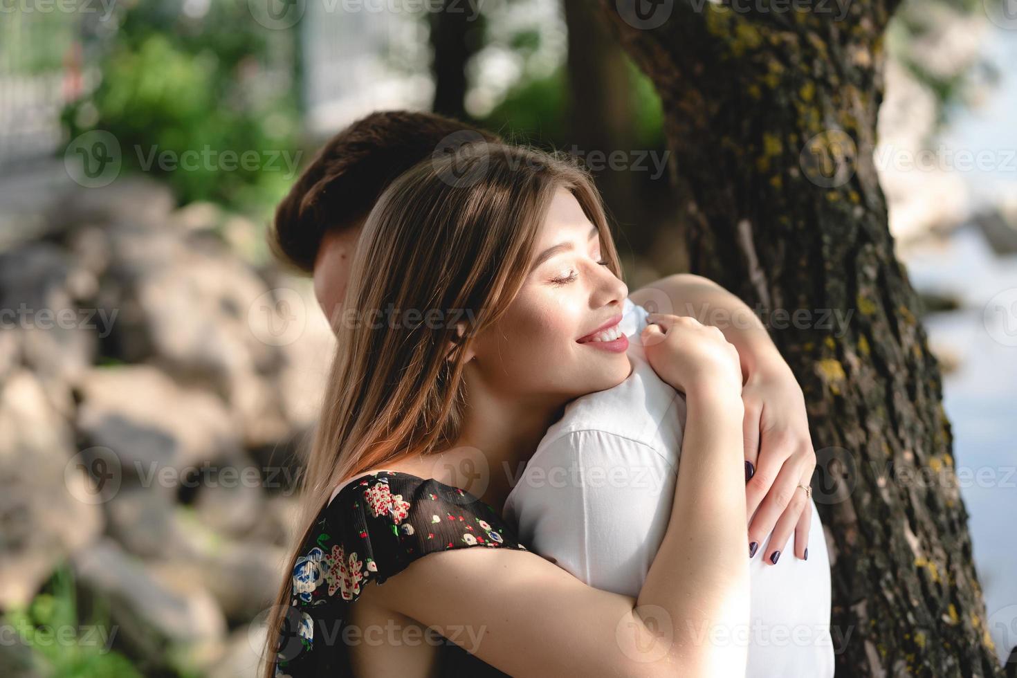 A pair of lovers posing on the camera. photo