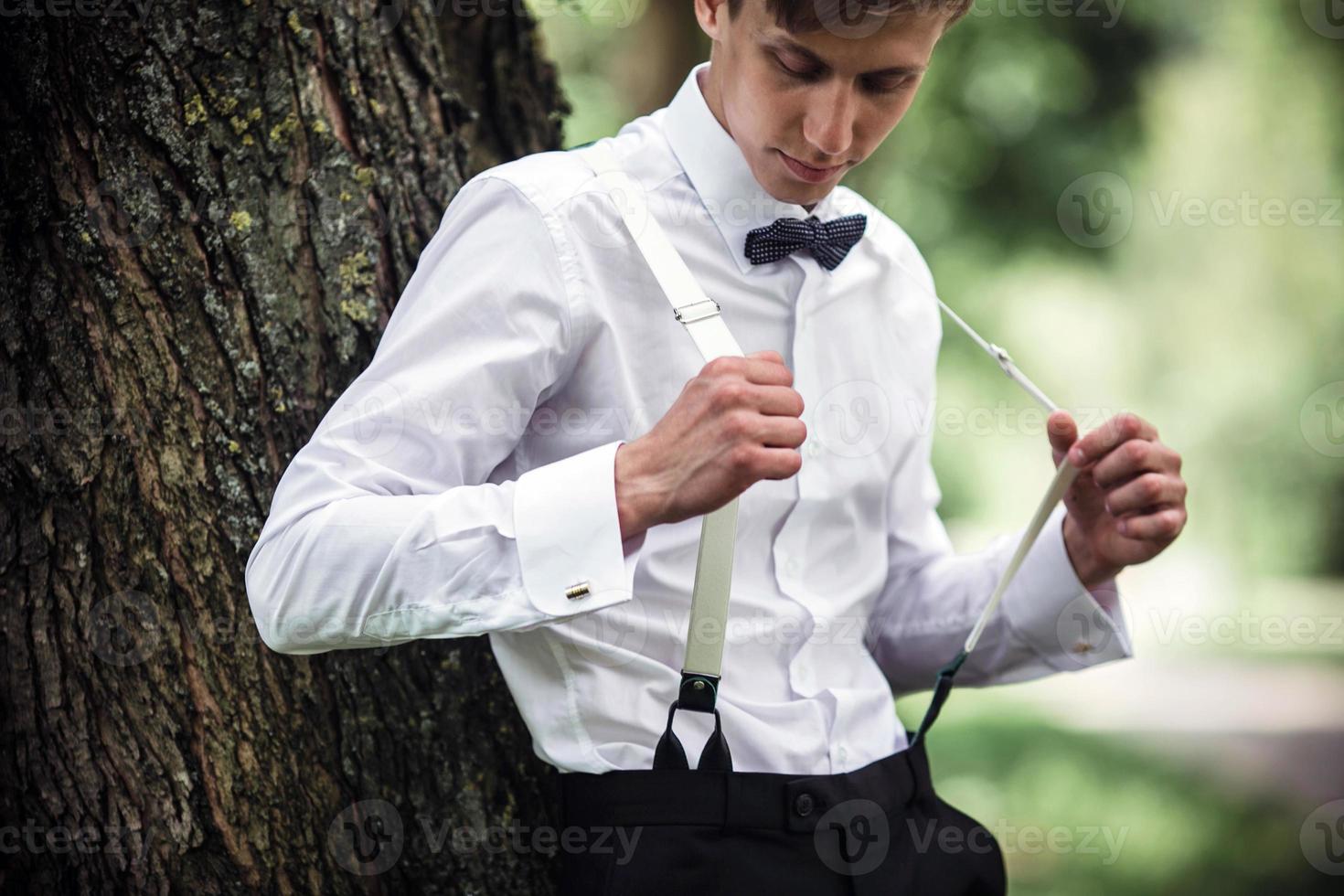 Groom in the forest photo
