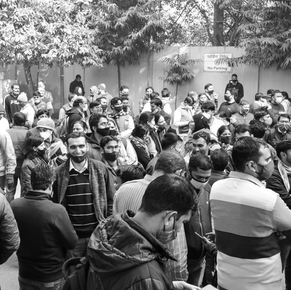Delhi, India December 25 2021 - Delhi Contractual Guest Teachers with posters, flags and graffitis protesting against Delhi AAP Government for making policy, Delhi Teacher protesting Black and White photo