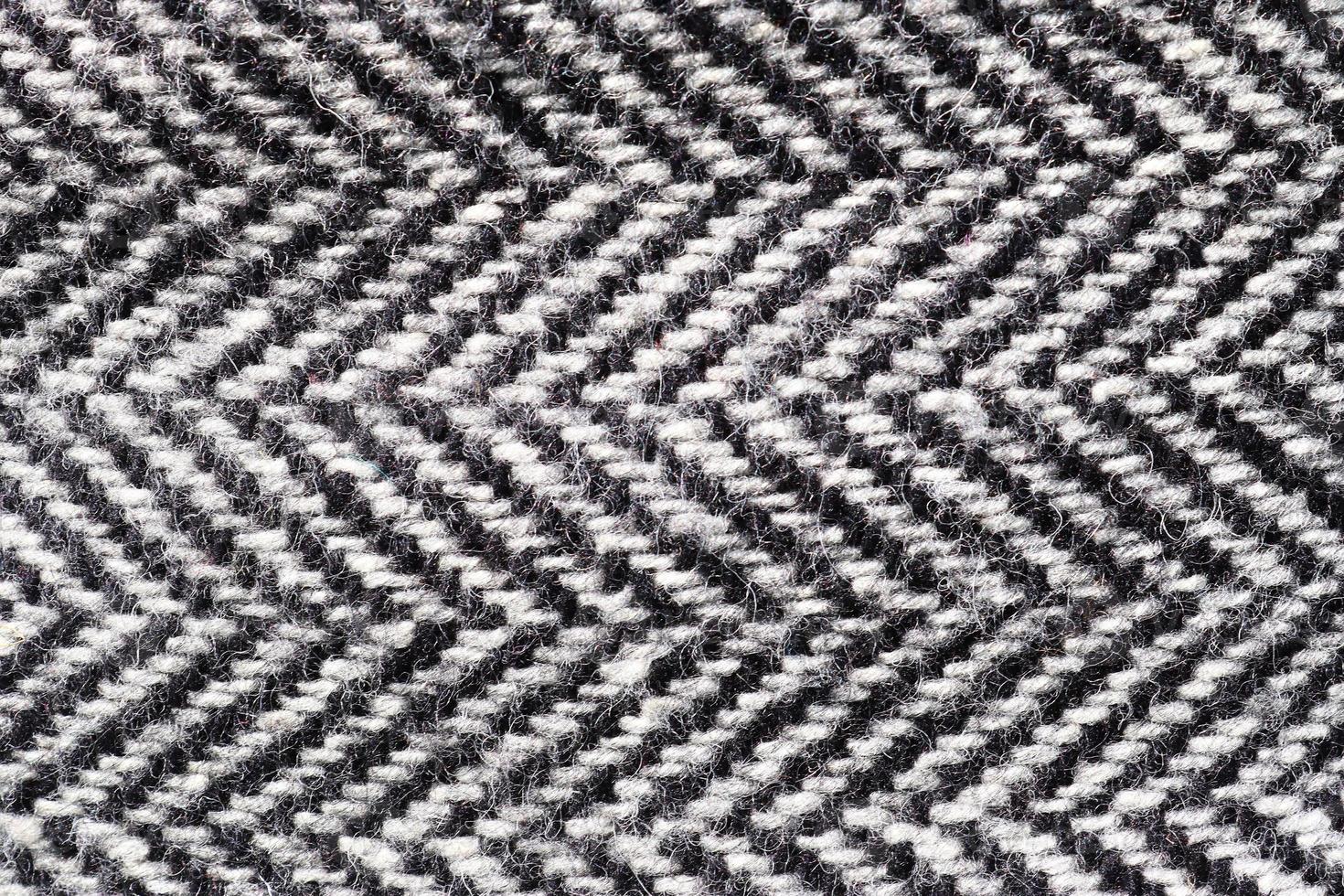 Detailed close up view on samples of cloth and fabrics in different colors found at a fabrics market photo